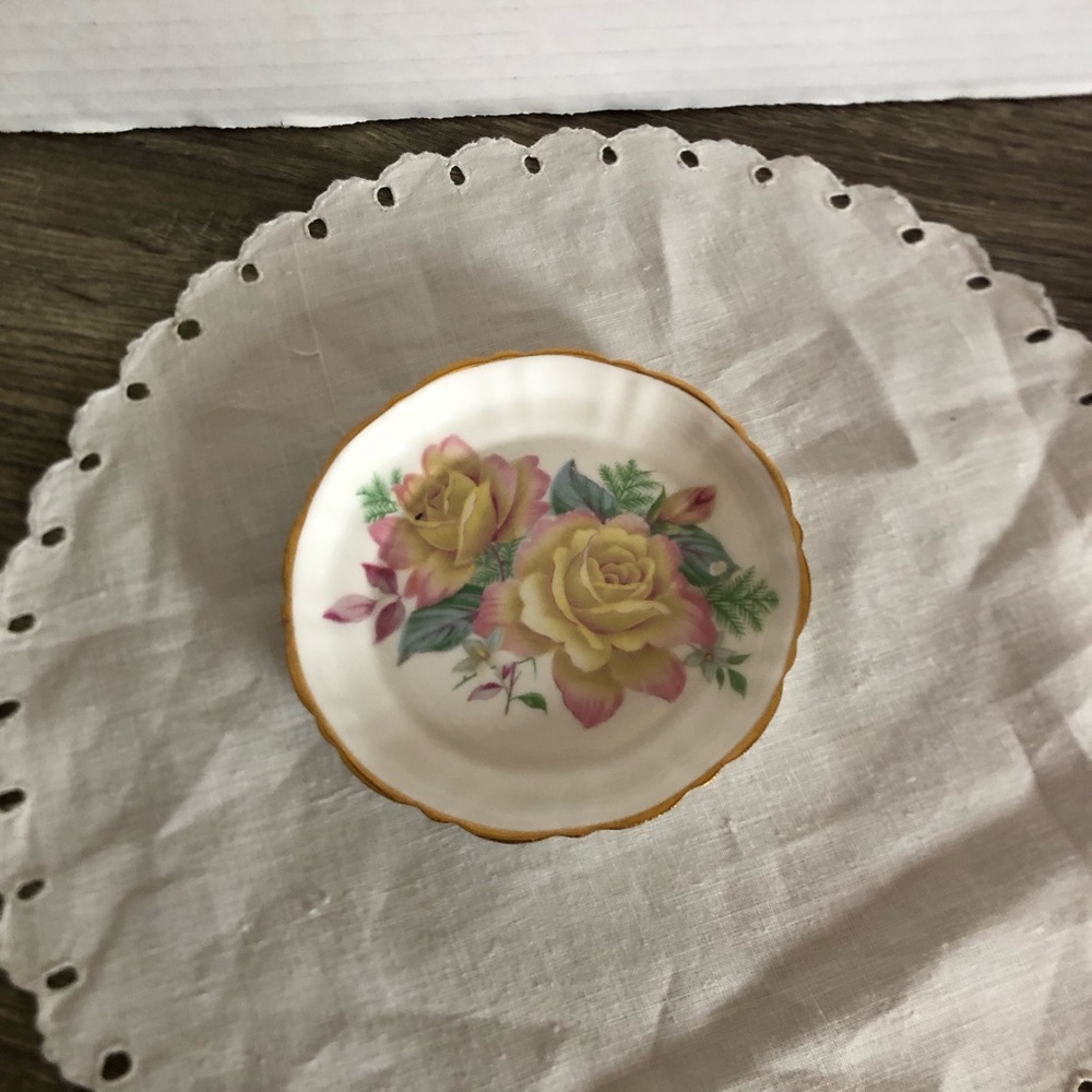 Vintage Porcelain Saucer with Yellow and Pink Floral Design